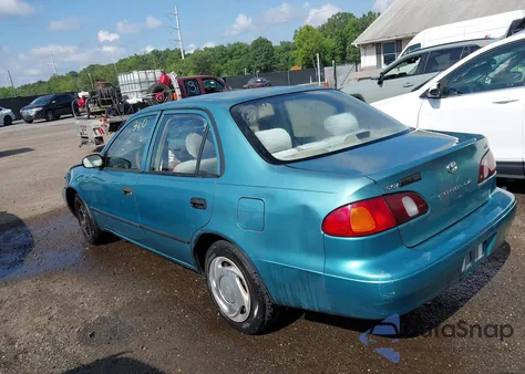 1999 Toyota Corolla Ce из США, поврежденный, VIN 2T1BR12E6XC134802